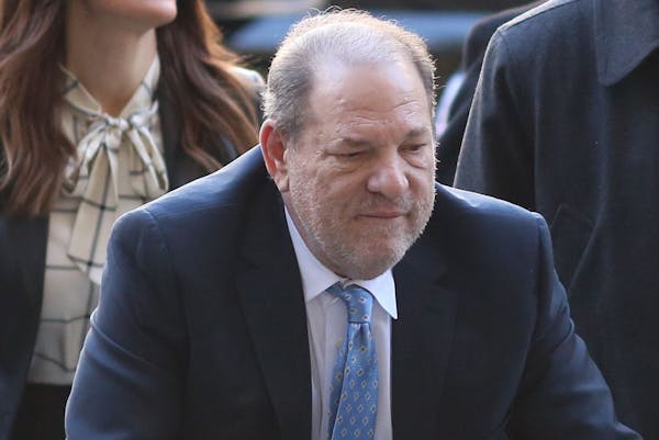 Harvey Weinstein arrives at Manhattan Criminal Court with his attorneys on Feb. 24, 2020.