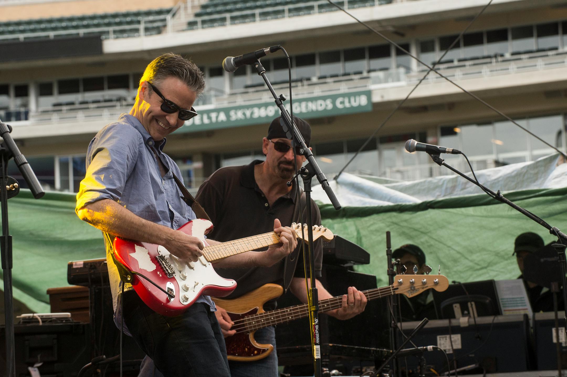 Erik Hess; Freelance Photographer Martin Zellar, left, and Nick Ciola during a Gear Daddies Skyline Music Festival gig at Target Field.