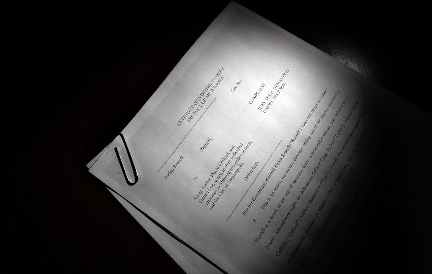 The legal complaint against several Minneapolis officers by Rickia Russell, contains the details of what she said occurred during an errant raid on the resident of her boyfriend while she was present. Russell suffered severe burns when Minneapolis police erroneously served a "no-knock" warrant at her boyfriend's apartment on Valentine's Day. Officers threw flash-bang grenades into the residence, resulting in burns to Russell who sustained permanent tissue damage, scaring and deformities to the b