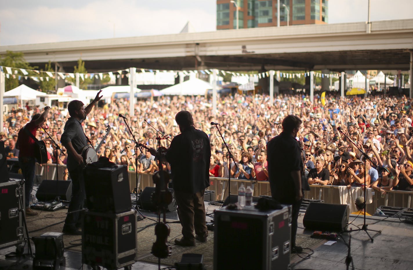 The band waved to the crowd after their set at the Forecastle Festival in Louisville, KY. Shown are, from left, Dave Simonett, Dave Carroll, Ryan Young, and Erik Berry. ] JEFF WHEELER &#x201a;&#xc4;&#xa2; jeff.wheeler@startribune.com Trampled By Turtles performed at the Forecastle Festival in Louisville, Kentucky on Sunday, July 20, 2014.