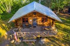 This log cabin is set on a private island on Farm Lake near Ely.