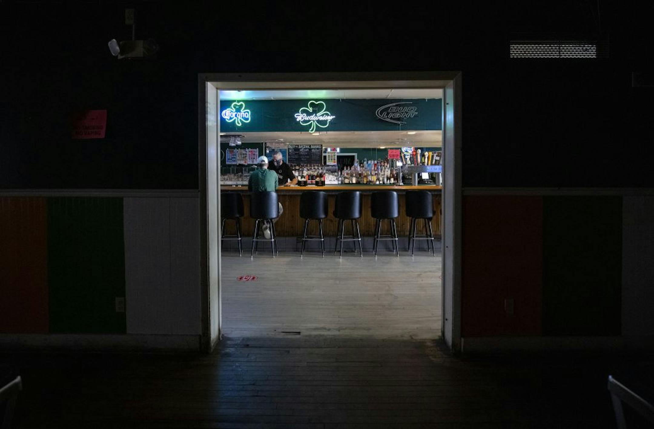 Dan English owner of Mulligan's Pub in downtown Winona tended the bar on a slow Thursday afternoon.