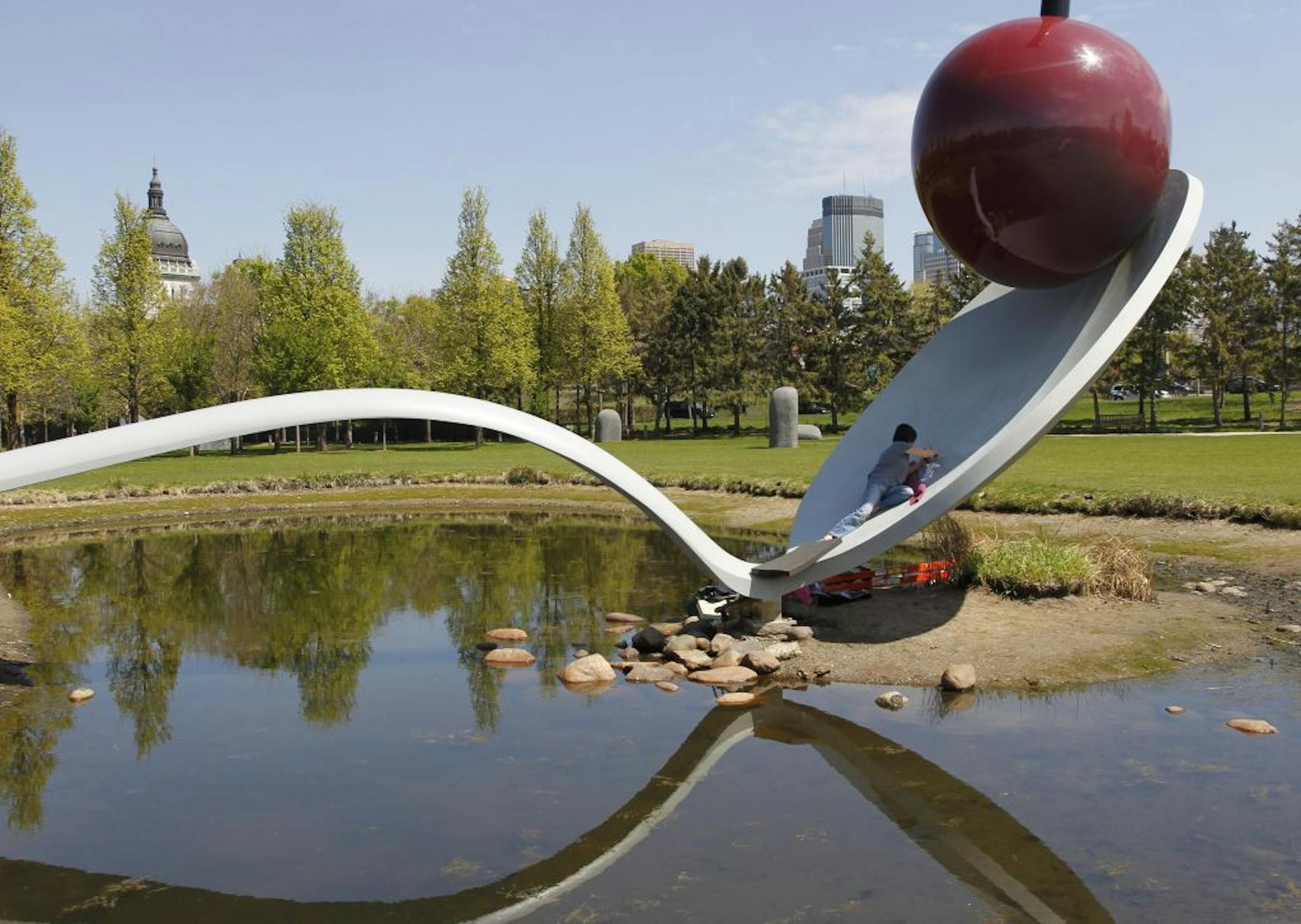 Donna Haberman of Midwest Art Conservation Center removed graffiti from "Spoonbridge."