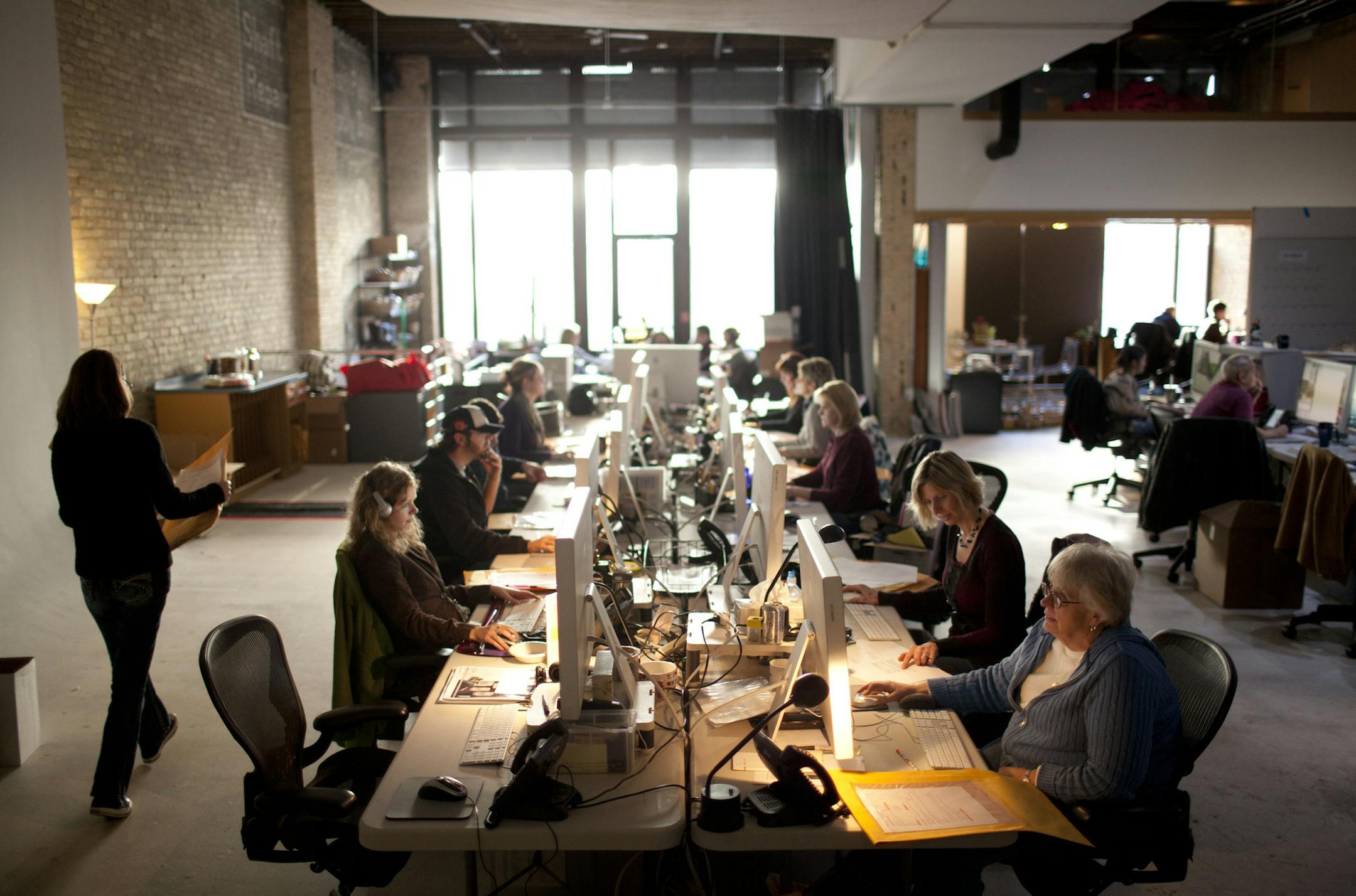 Periscope employees working in their former photo studio Tuesday afternoon, December 20, 2011, while renovations to the building on a Washington Ave. are completed. Employees at the Minneapolis ad agency Periscope will remember the year 2011 as a bustling one. The workforce grew by nearly one third to 330. Billings topped $300 million. The client roster grew to include the likes of Columbia apparel, ExxonMobil and animal and pet food giant Nutrena. And just this fall, the Periscope real estate f