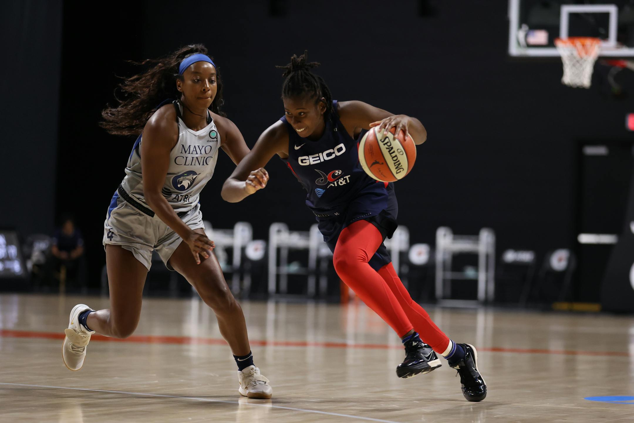 Ariel Atkins of the Mystics drives to the basket against the Lynx on Tuesday night in Florida.