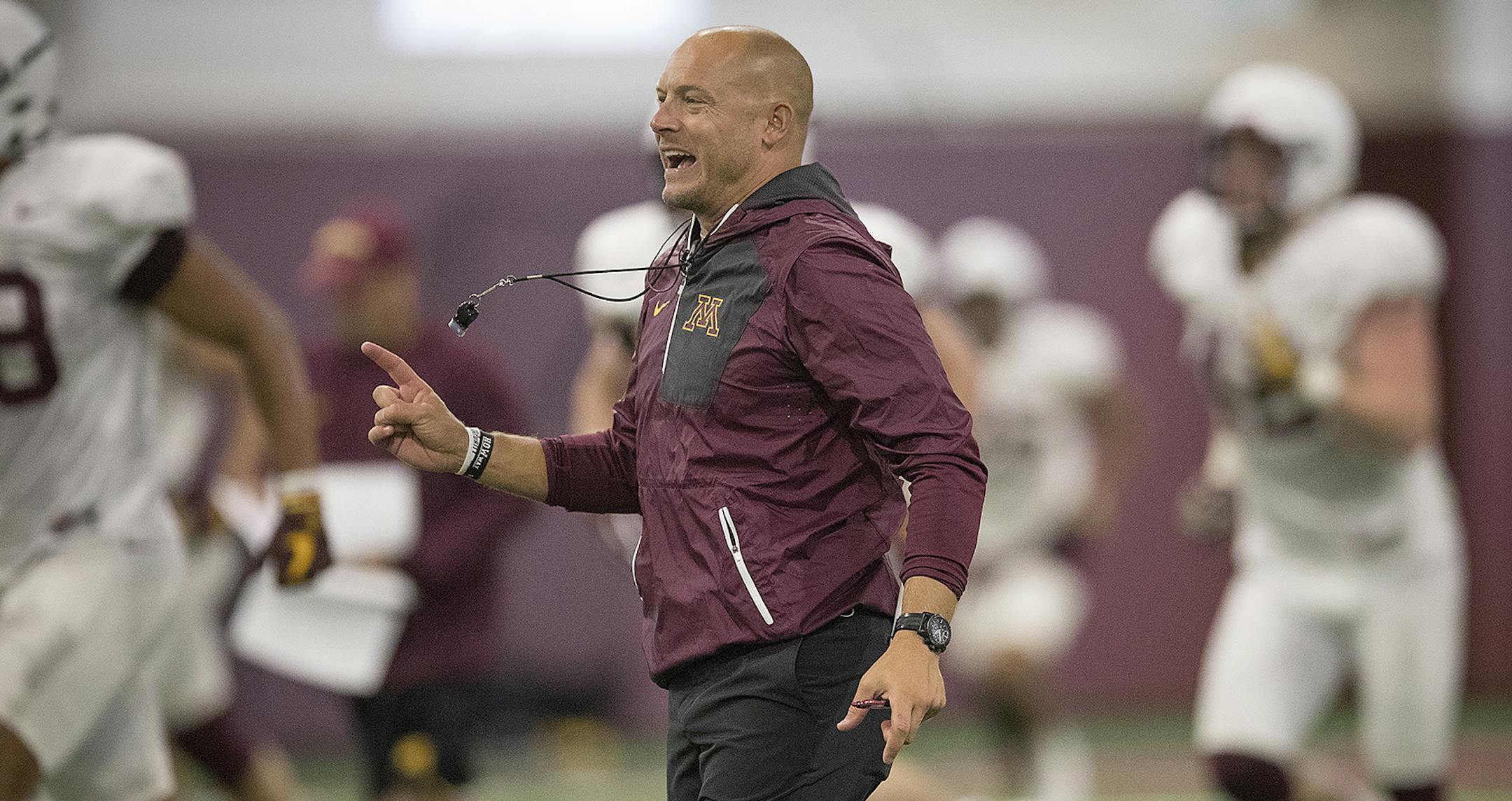 Coach P.J. Fleck took to the field for the Gophers' first open practice, overseeing a team that he called more advanced at this time than the 2017 squad. that was open to the public at the Athletes Village at the University of Minnesota in Minneapolis, MN. ] ELIZABETH FLORES ï liz.flores@startribune.com