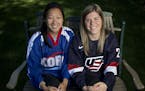 Sisters Marissa and Hannah Brandt. Marissa was born in South Korea and is a member of its women's Olympic hockey team. Hannah plays for the US team. ]