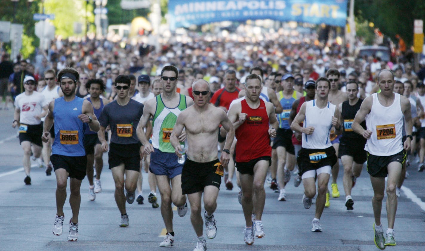 JERRY HOLT &#x2022; jerry.holt@startribune.com Minneapolis 6/06/10 The second Minneapolis Marathon. The race starts down by the Stone Arch Bridge and goes to Fort Snelling and back. We need featurish art for a standalone photo in sports ... News might also be interested? . IN THIS PHOTO: ] Thousands of runners took off at the start of the Minneapolis Marathon on Sunday morning.