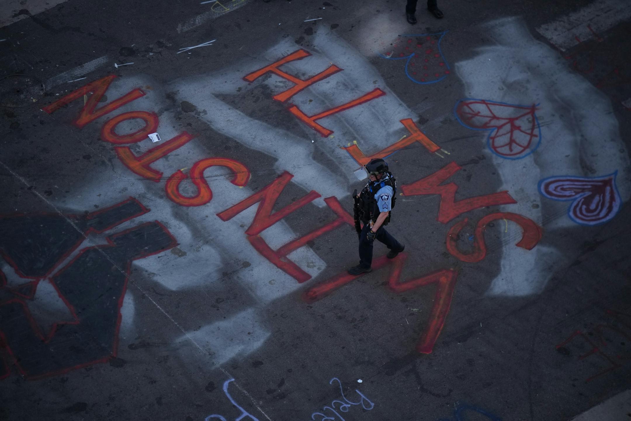 Minneapolis Police descended on the block long stretch of Lake St. in Uptown just before sunset Tuesday night, June 15, 2021 to dismantle the barricades erected by protesters.
