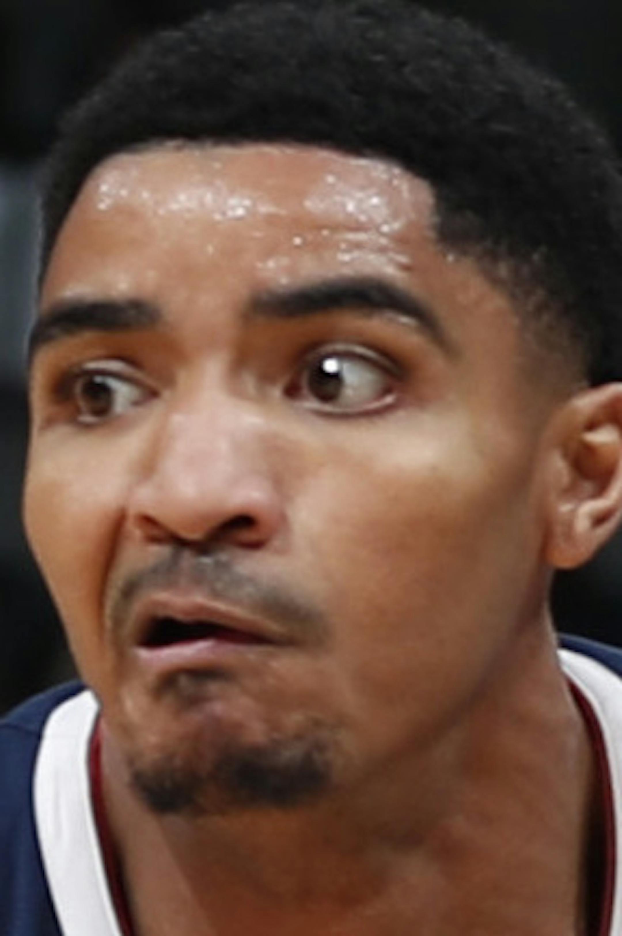 Atlanta Hawks guard Kent Bazemore (24) and Denver Nuggets guard Gary Harris (14) in the second half of an NBA basketball game Thursday, Nov. 15, 2018, in Denver. The Nuggets won 138-93. (AP Photo/David Zalubowski)