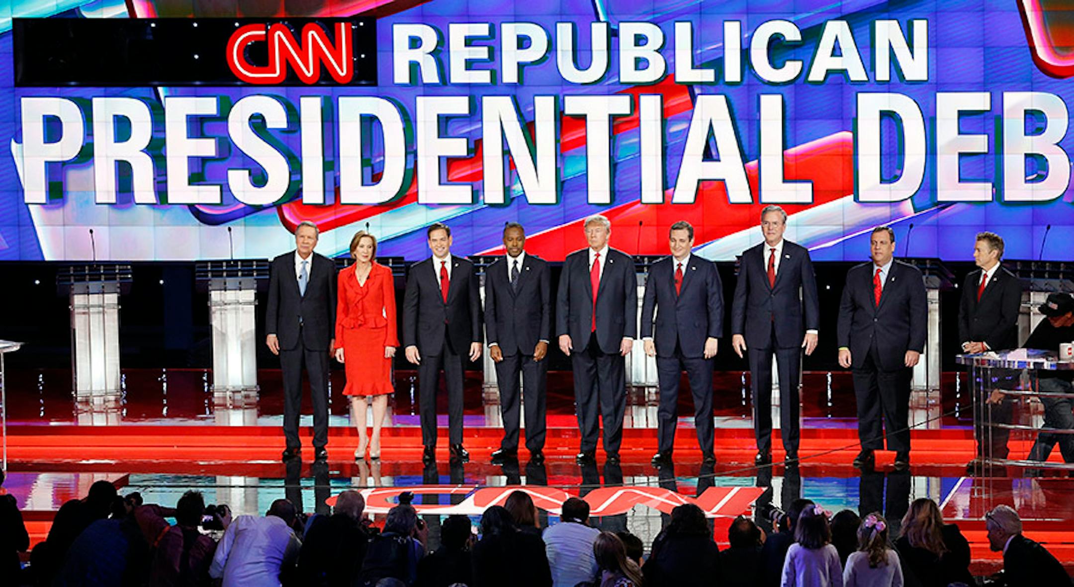 Republican presidential candidates, from left, John Kasich, Carly Fiorina, Marco Rubio, Ben Carson, Donald Trump, Ted Cruz, Jeb Bush, Chris Christie, and Rand Paul take the stage during the CNN Republican presidential debate at the Venetian Hotel & Casino on Tuesday, Dec. 15, 2015, in Las Vegas.