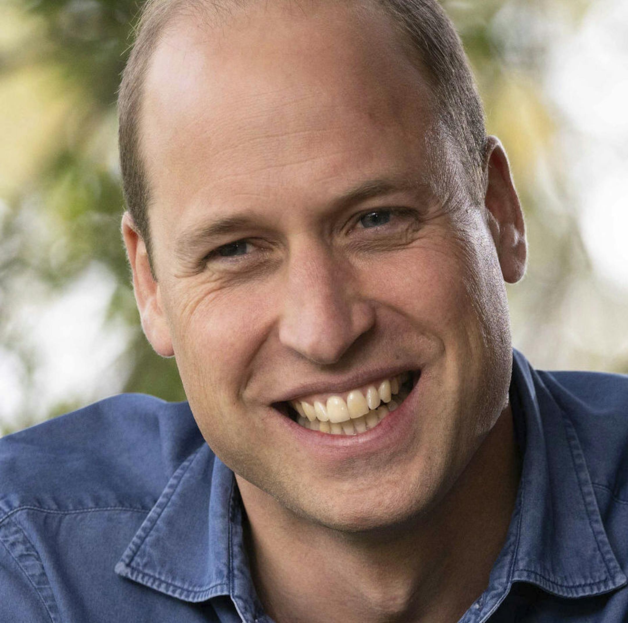 In this undated photo issued by Kensington Palace on Saturday, Oct. 10, 2020, Prince William sits under the canopy of an oak tree during a recording to promote the first TED conference, in the grounds of Windsor Castle. The future king has said there is "no choice but to succeed" when tackling the problem of climate change over the next 10 years. (Kensington Palace via AP)