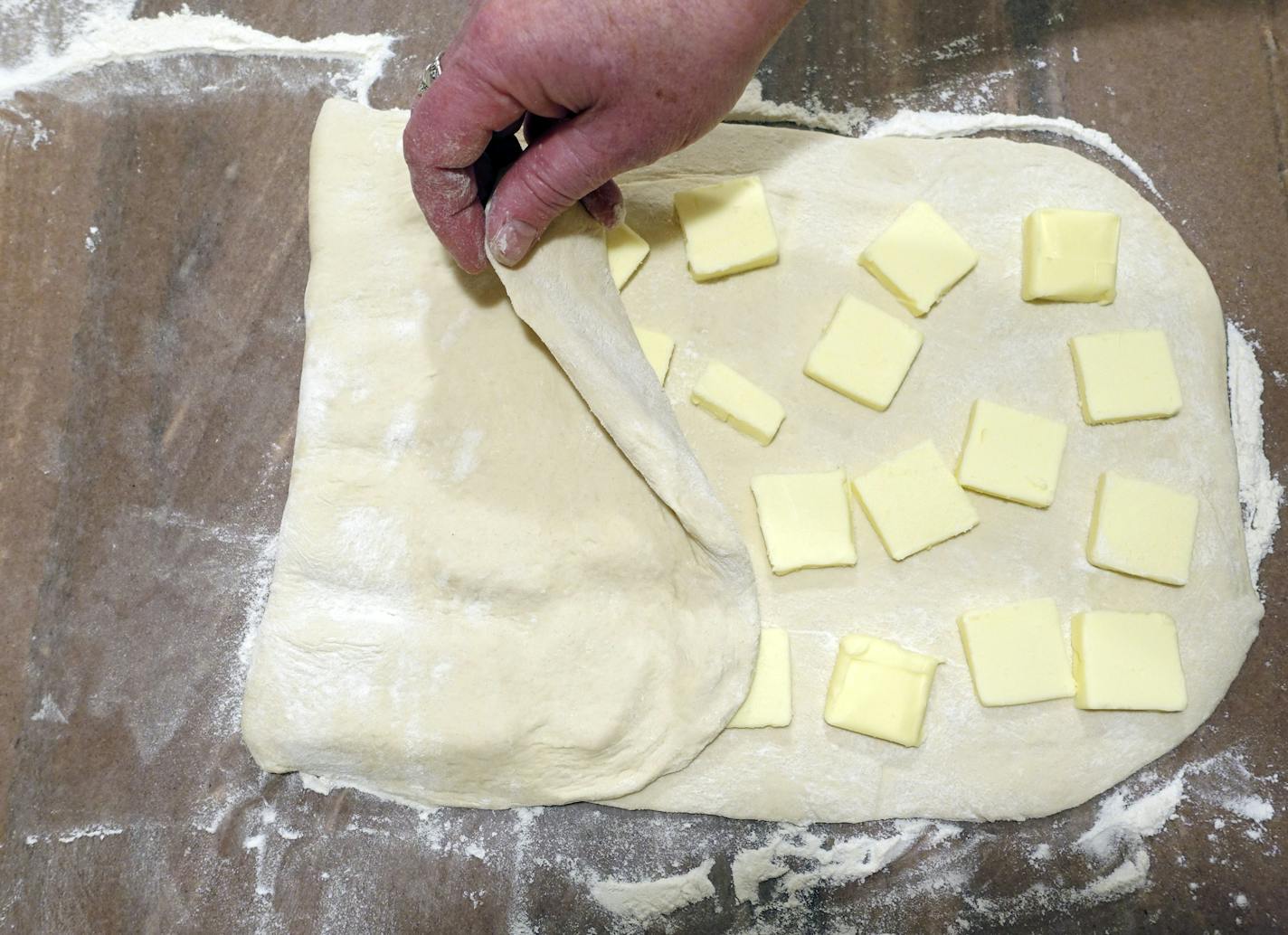 Baking Central does Kouign Amann, a pastry that seems like a lot of steps -- but it's really just one step sone several times. And the results are worth it. Saxo #: 626287