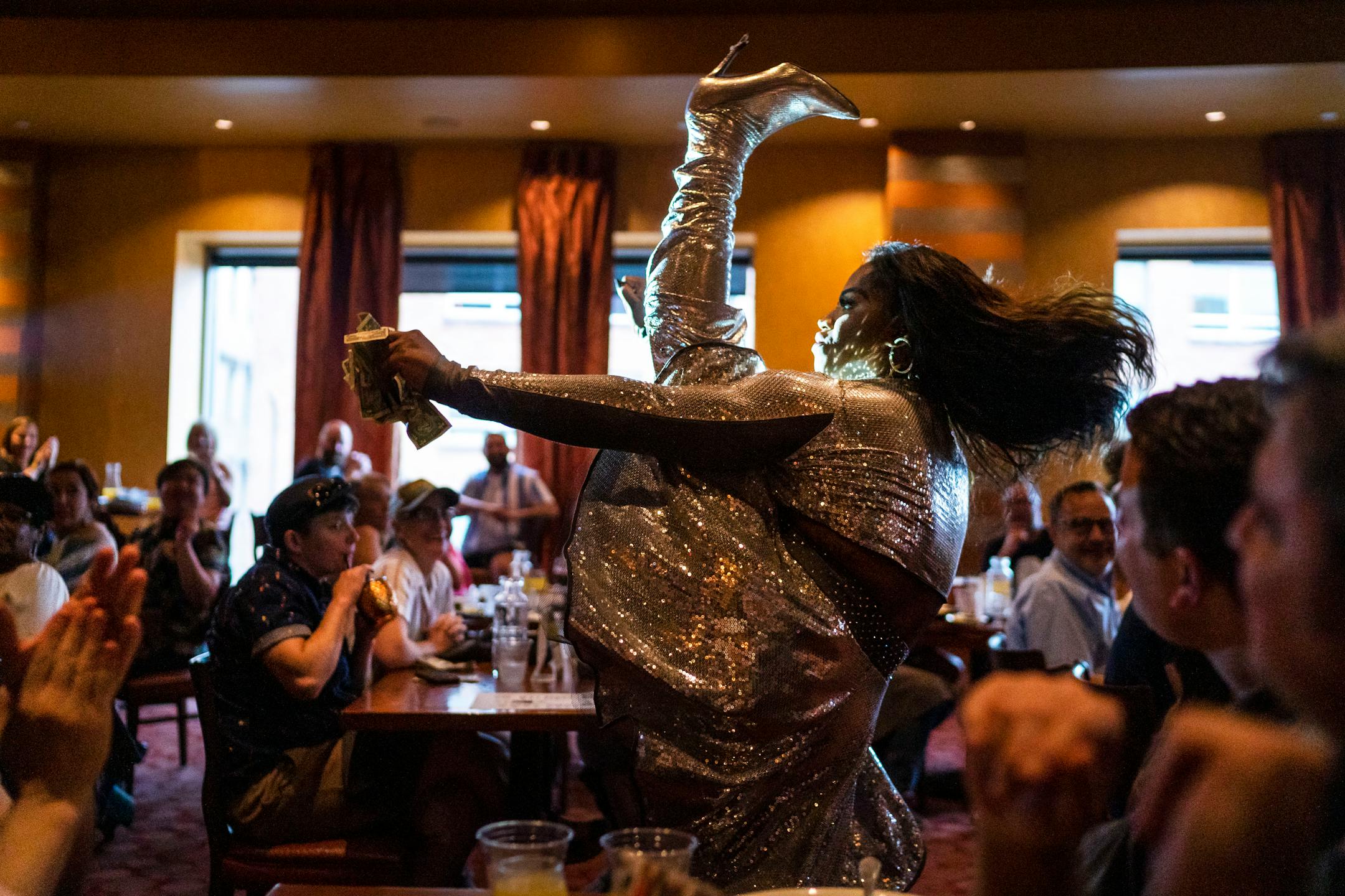 Tygra performs a series of high kicks for the crowd while during their performance at Crave on Sunday, June 20, 2021, in Minneapolis. ] ANTRANIK TAVITIAN • anto.tavitian@startribune.com
