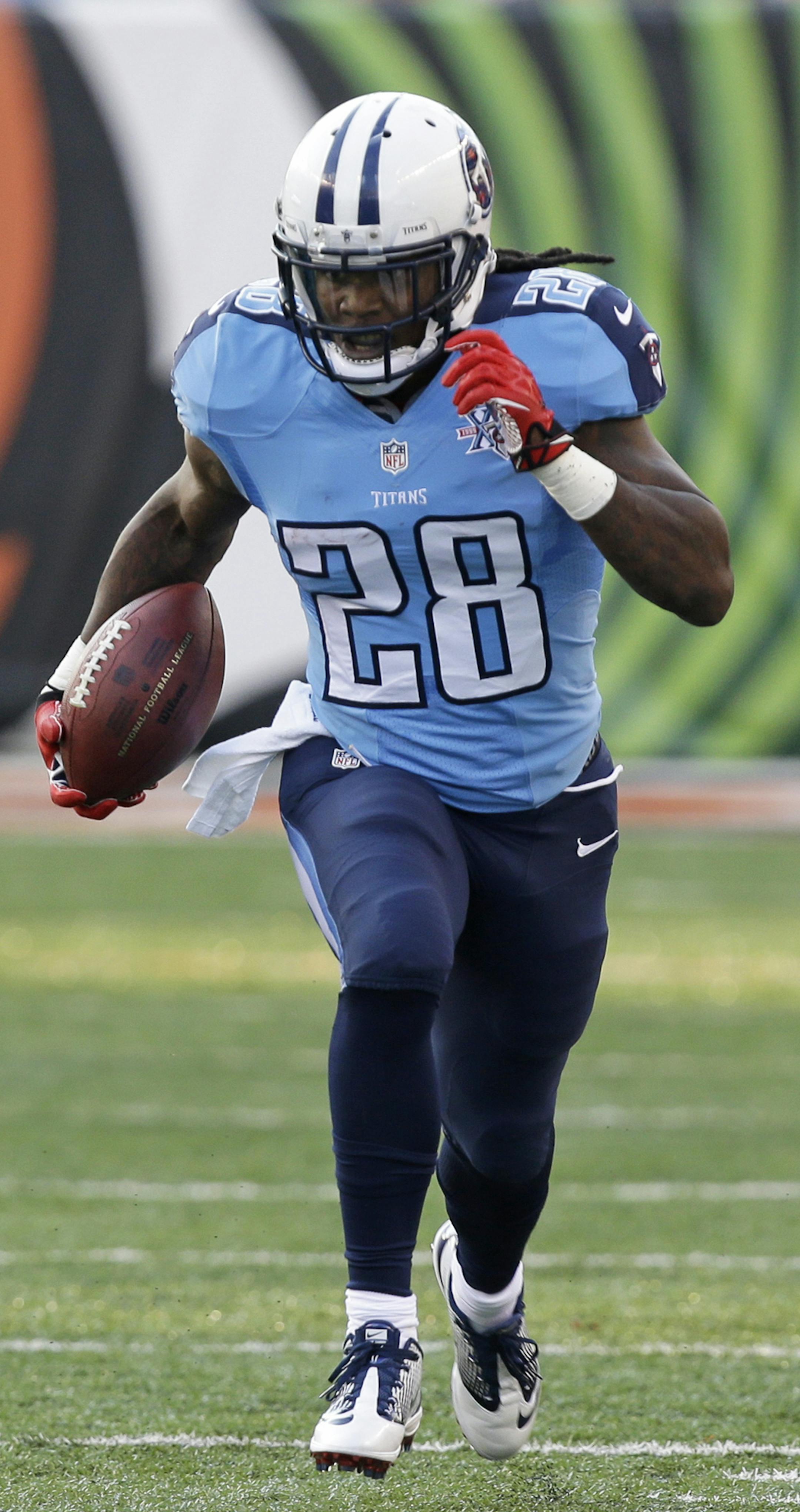 Tennessee Titans running back Chris Johnson runs against the Cincinnati Bengals in the first half of an NFL preseason football game, Saturday, Aug. 17, 2013, in Cincinnati. (AP Photo/Al Behrman) ORG XMIT: NYOTK