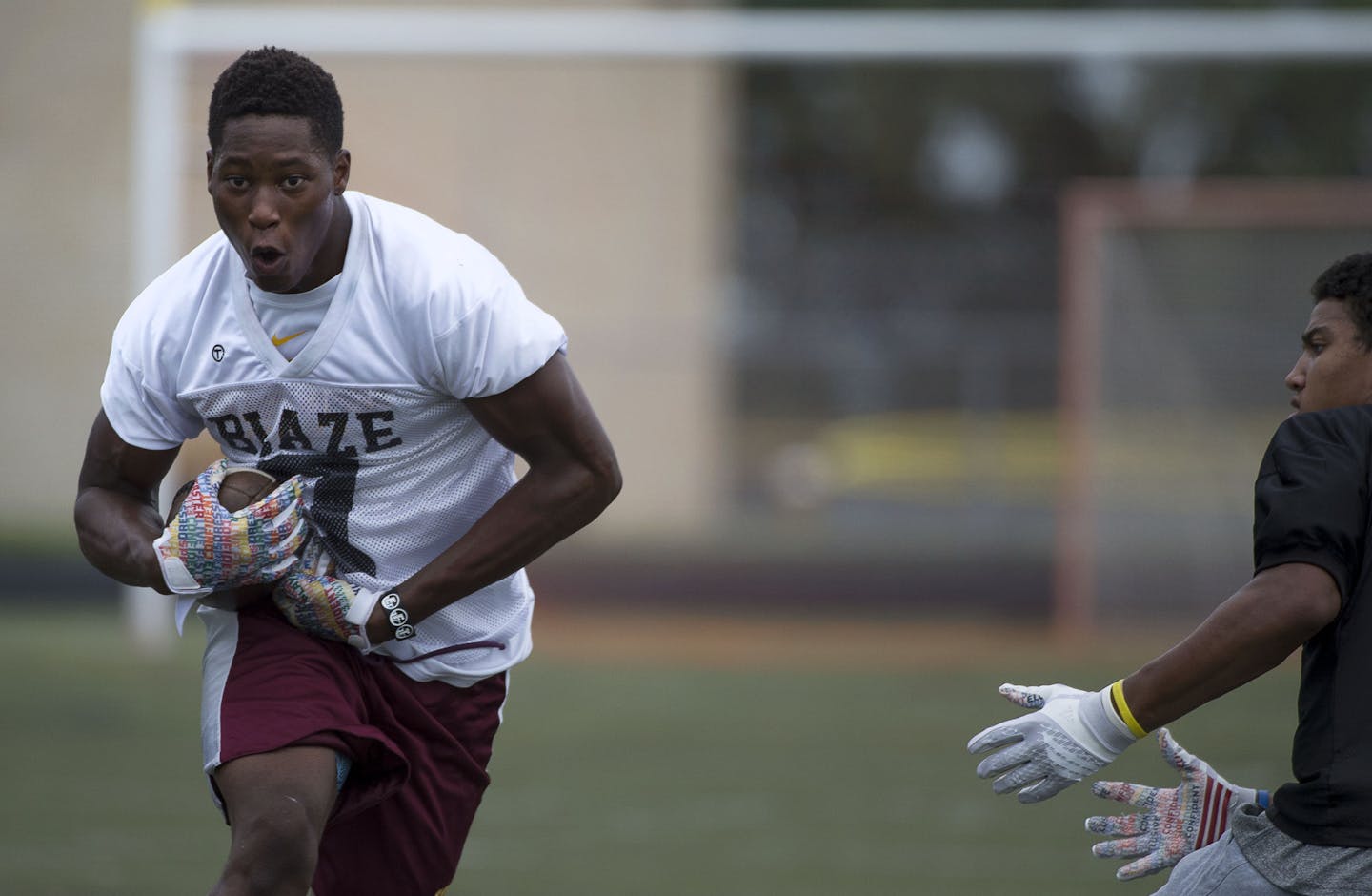 On left, Burnsville quarterback and safety Kamal Martin worked through drills during football practice at Burnsville High School in Burnsville, Minn. on Thursday August 13, 2015. ] RACHEL WOOLF &#xb7; rachel.woolf@startribune.com