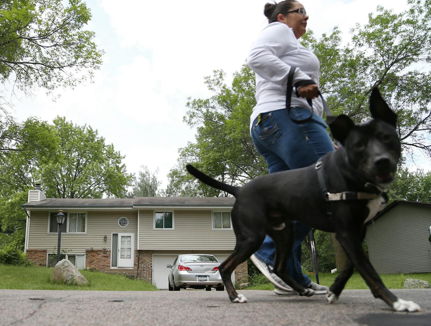 A woman walked her dog passed 2457 Pearson Parkway were a woman body was found Thursday May 2, 2016 in Brooklyn Park MN.] Jerry Holt /Jerry.Holt@Startribune.com ORG XMIT: MIN1606021315192180