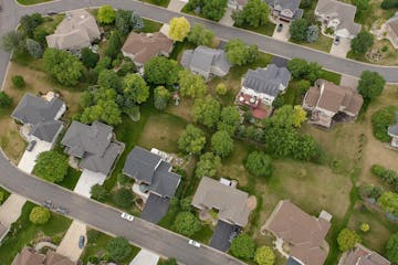 The suburb of Prior Lake features large homes abutting golf courses and lakes. Photo by Mark Vancleave.