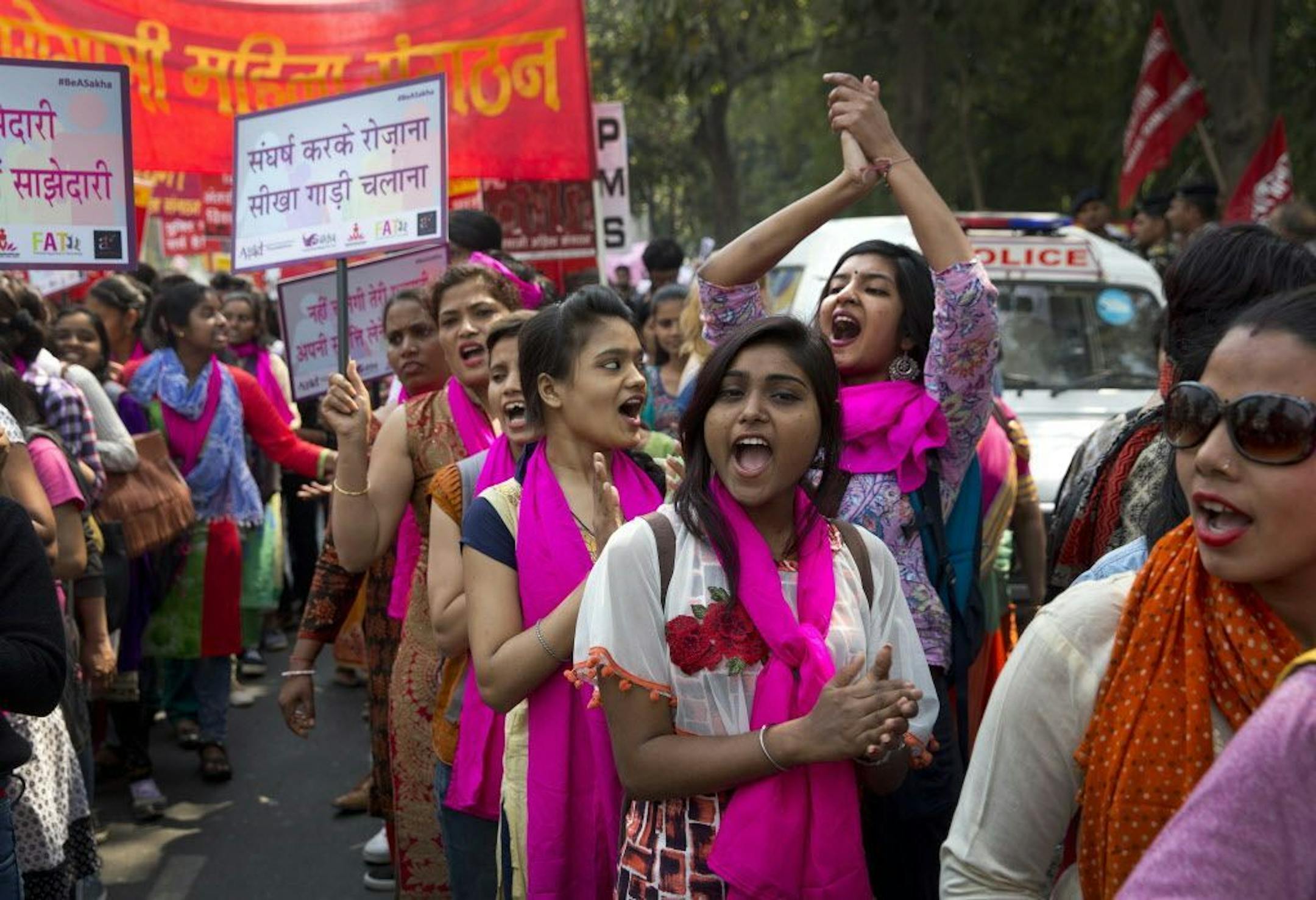 Indian women sing and dance during a march to celebrate International Women's Day in New Delhi, India, Thursday, March 8, 2018. Hundreds of women held street plays and march in the Indian capital highlighting domestic violence, sexual attacks and discrimination in jobs and wages against them. Violent crime against women has been on the rise in India despite tough laws enacted by the government.