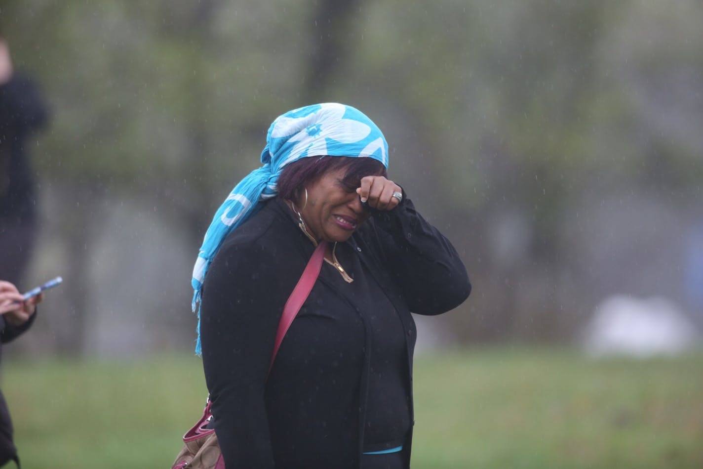 A woman named Vera wept outside Paisley Park. She said she knew Prince for 30 years.