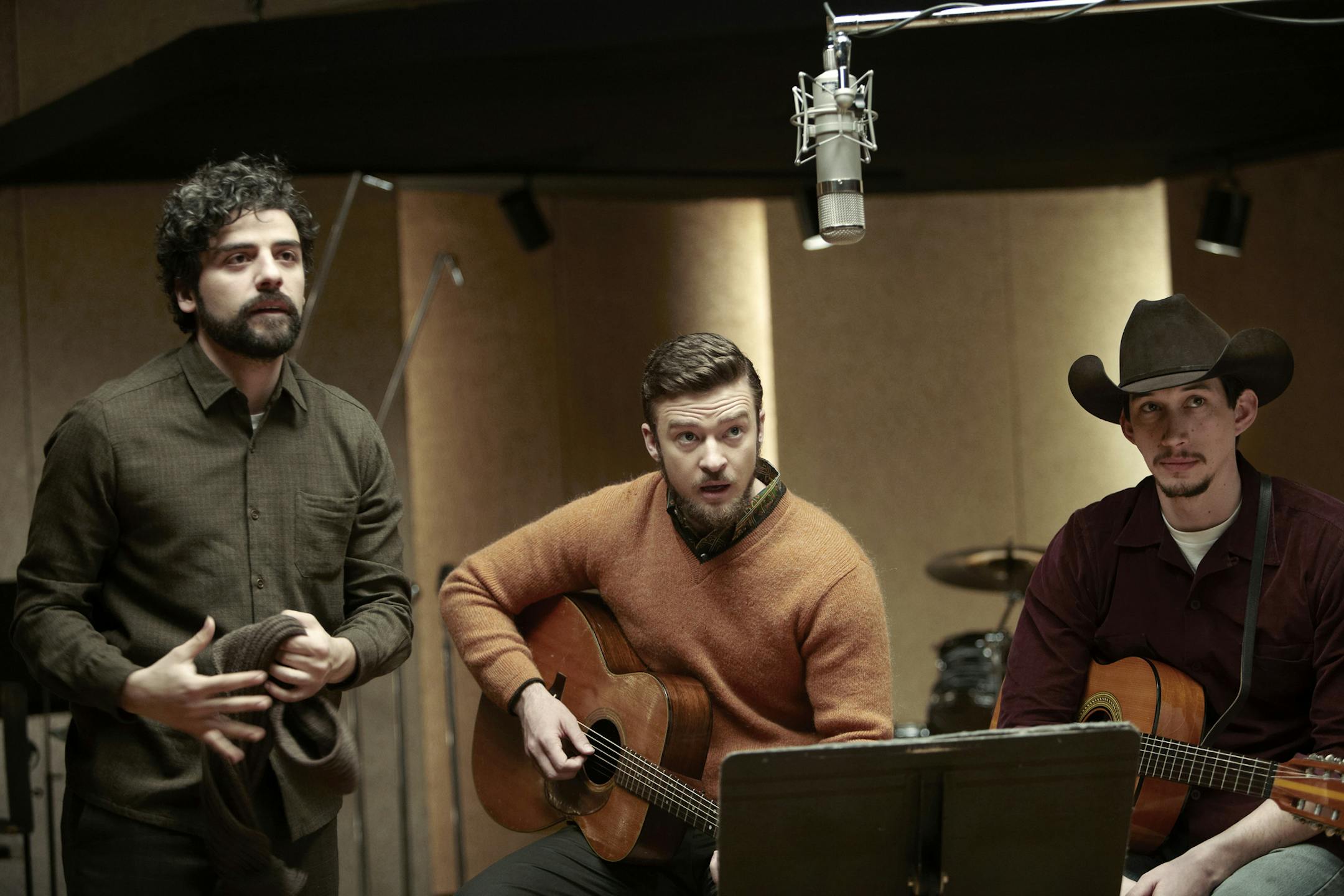 This film image released by CBS FIlms shows, from left, Oscar Isaac, Justin Timberlake and Adam Driver in a scene from "Inside Llewyn Davis." The film was nominated for a Golden Globe for best motion picture, musical or comedy on Thursday, Dec. 12, 2013. The 71st annual Golden Globes will air on Sunday, Jan. 12. (AP Photo/CBS FIlms, Alison Rosa)