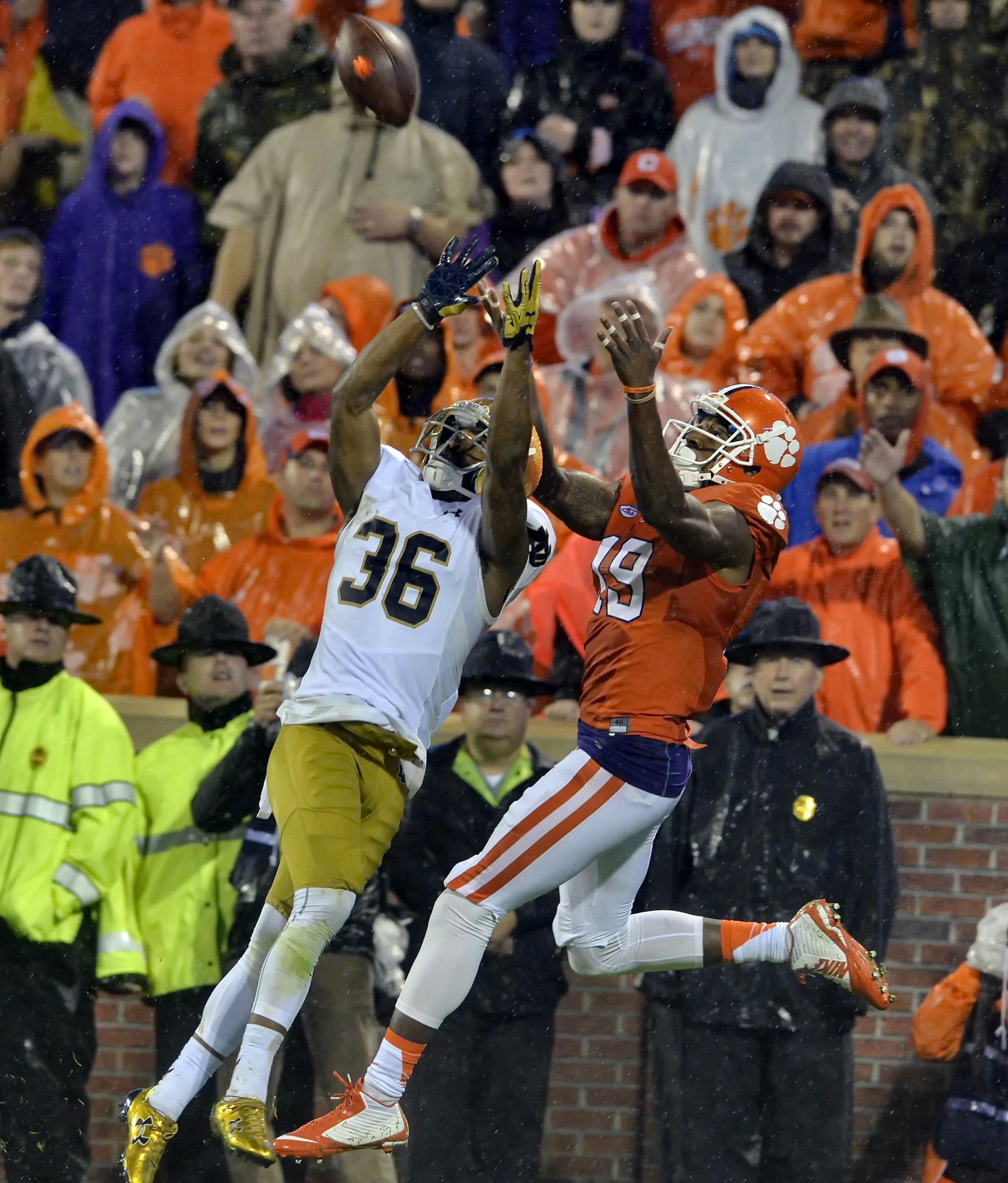 Notre Dame's Cole Luke (36) pulls down an interception intended for Clemson's Charone Peake during the second half of an NCAA college football game Saturday, Oct. 3, 2015, in Clemson, S.C. Clemson won 24-22. (AP Photo/Richard Shiro)