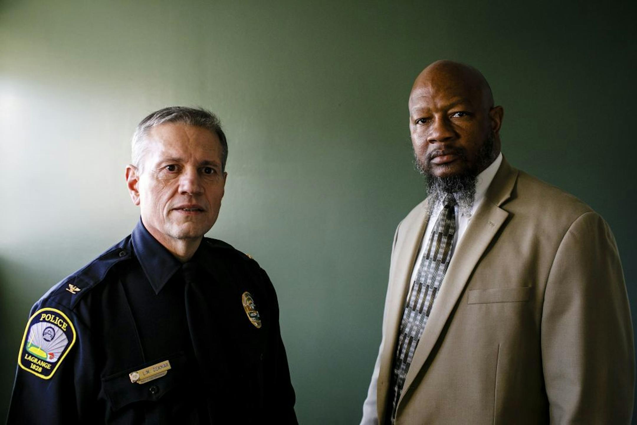 Police Chief Louis Dekmar, left, of LaGrange, Ga., and Ernest Ward, president of the Troup County NAACP, at the LaGrange Police Department, Jan. 26, 2017. Dekmar will issue a public apology for the 1940 lynching of a 16-year-old African-American boy, part of a renewed push across the South to acknowledge the brutal mob violence that was used to enforce the system of racial segregation.