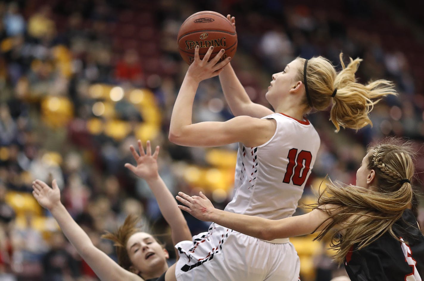 Maranatha's Kylie Post was call for charging on Ada-Borup's Emma Kroshus during quarter finals Class 1A girls action at Mariucci Arena Thursday March 16, 2017 in Minneapolis, MN.] Class 1A girls' basketball state tournament quarterfinals between Maranatha Christian Academy Mustangs beat the Ada-Borup Cougars 67-65 in overtime. JERRY HOLT &#xef; jerry.holt@startribune.com