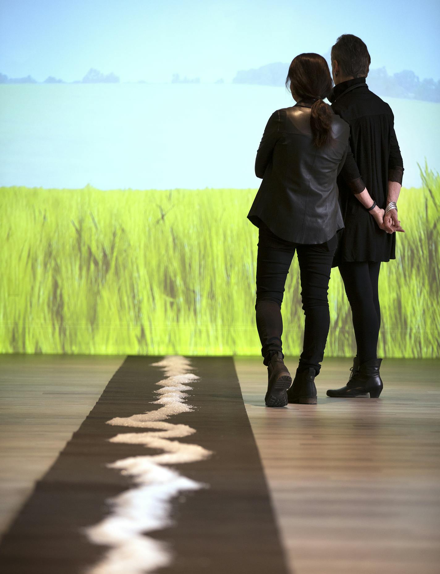 Minneapolis-based artist Harriet Bart, right, and Boston-based artist Yu-Wen Wu look at the video installation that is part of their joint exhibit "Random Walks and Chance Encounters" at Minnesota Museum of American Art in St. Paul on Thursday, March 19, 2015. ] LEILA NAVIDI leila.navidi@startribune.com /