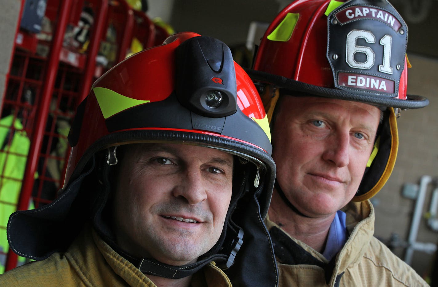 (left to right) Edina Fire Dept. Lt. Todd Porthan wore the new Euro style fire helmet with built in light and visors and Edina Fire Capt. Joel Forseth wore the older traditional fire hat. Photographed on 3/7/13. In a proud profession like firefighting, tradition matters. It's why a fierce eagle head that can catch on falling wires in a burning building still decorates the top of traditional fire helmets, and why some departments still use leather helmets. But a technology revolution is sweeping