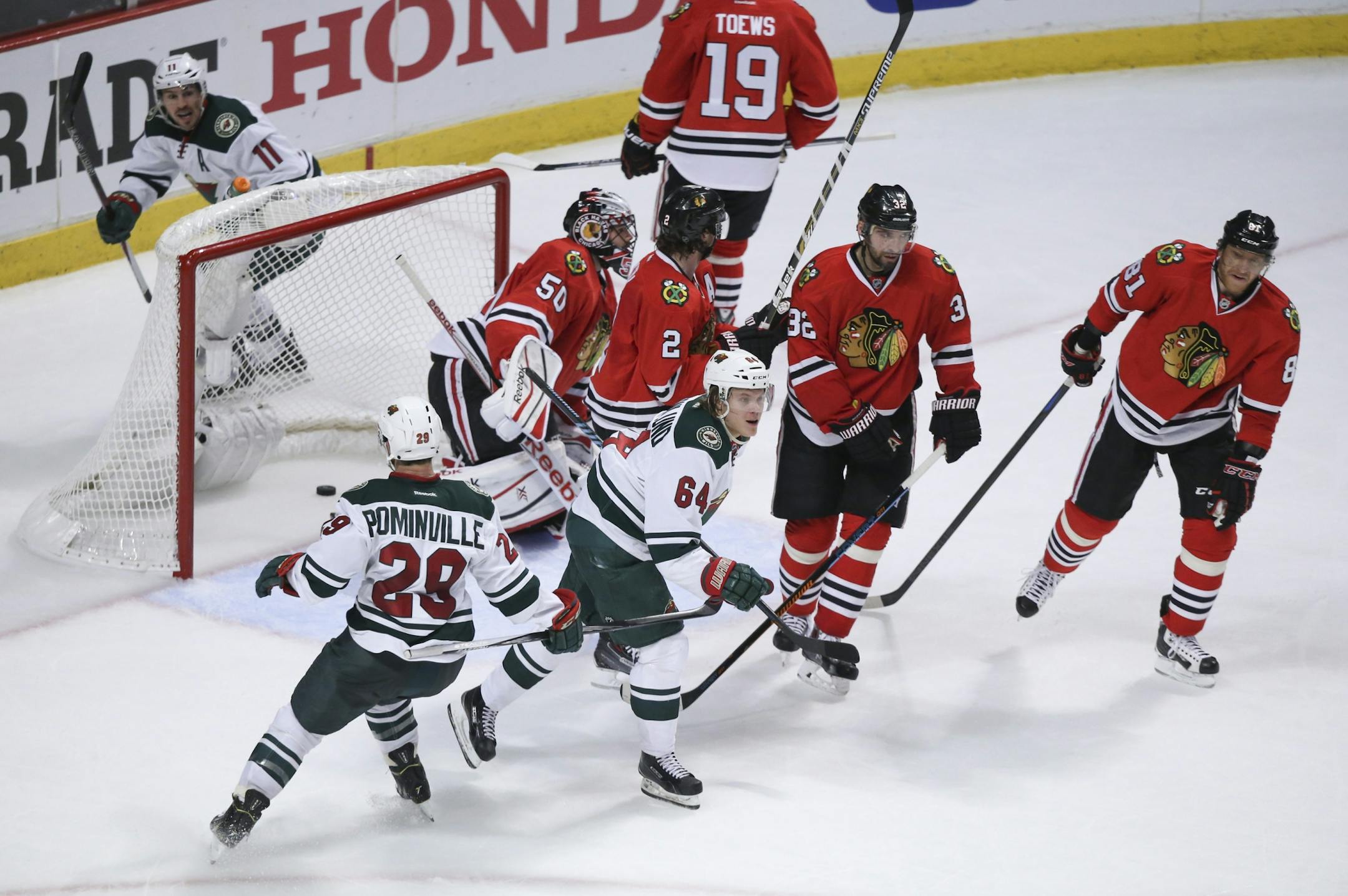 Wild center Mikael Granlund (64) after he put the puck past Blackhawks goalie Corey Crawford for the Wild's third goal of the second period, tying Chicago 3-3 Friday night.
