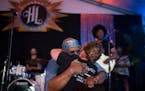 Vocalist Julius Collins embraced Lisa Franze, widow of co-founder Billy Franze, during Dr. Mambo Combo’s first set at Hook & Ladder Sunday night. Th