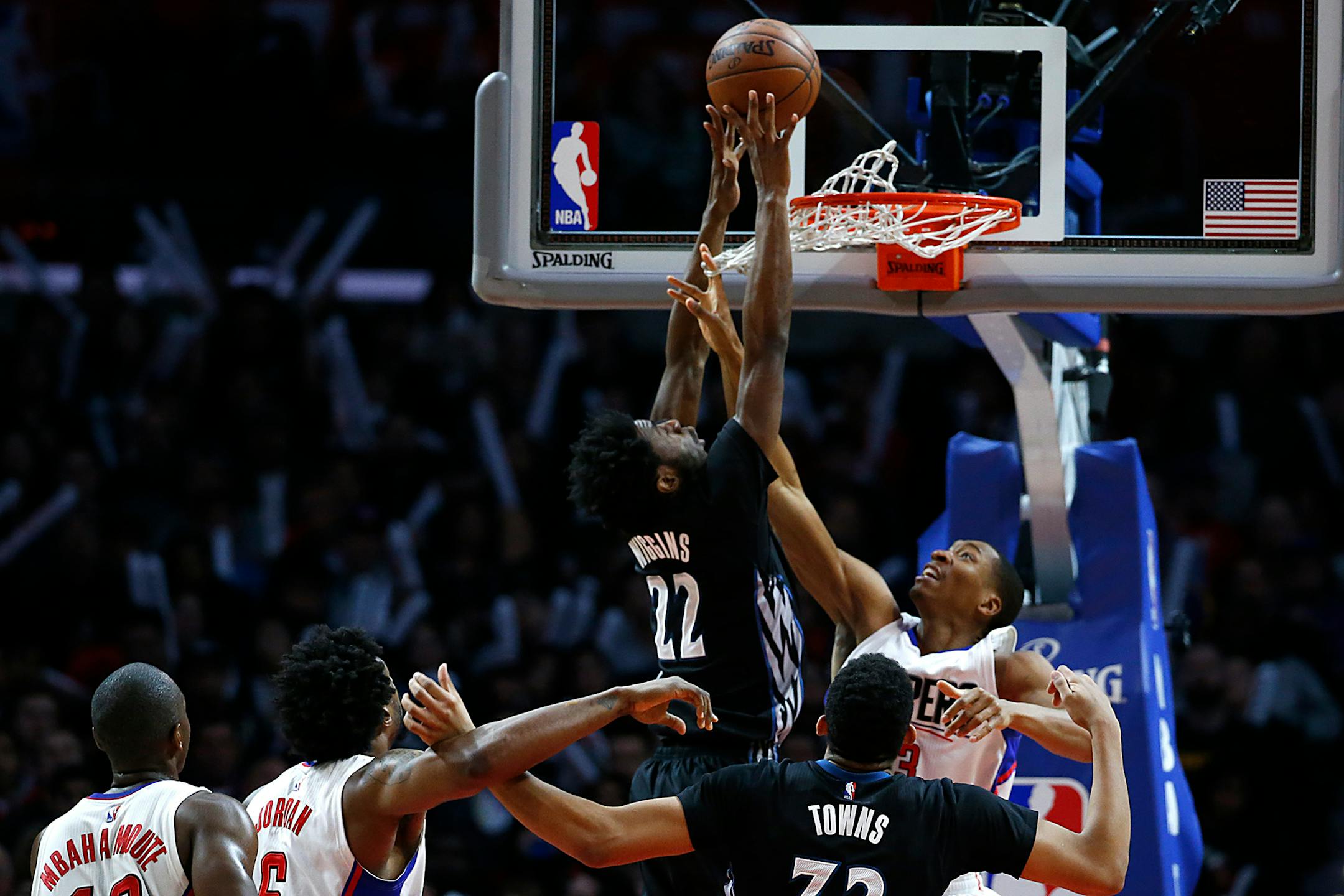 The Los Angeles Clippers' Wesley Johnson reaches through the net to defend the shot of the Minneota Timberwolves' Andrew Wiggins during second-half action at Staples Center in Los Angeles on Wednesday, Feb. 3, 2016. (Robert Gauthier/Los Angeles Times/TNS) ORG XMIT: 1180268