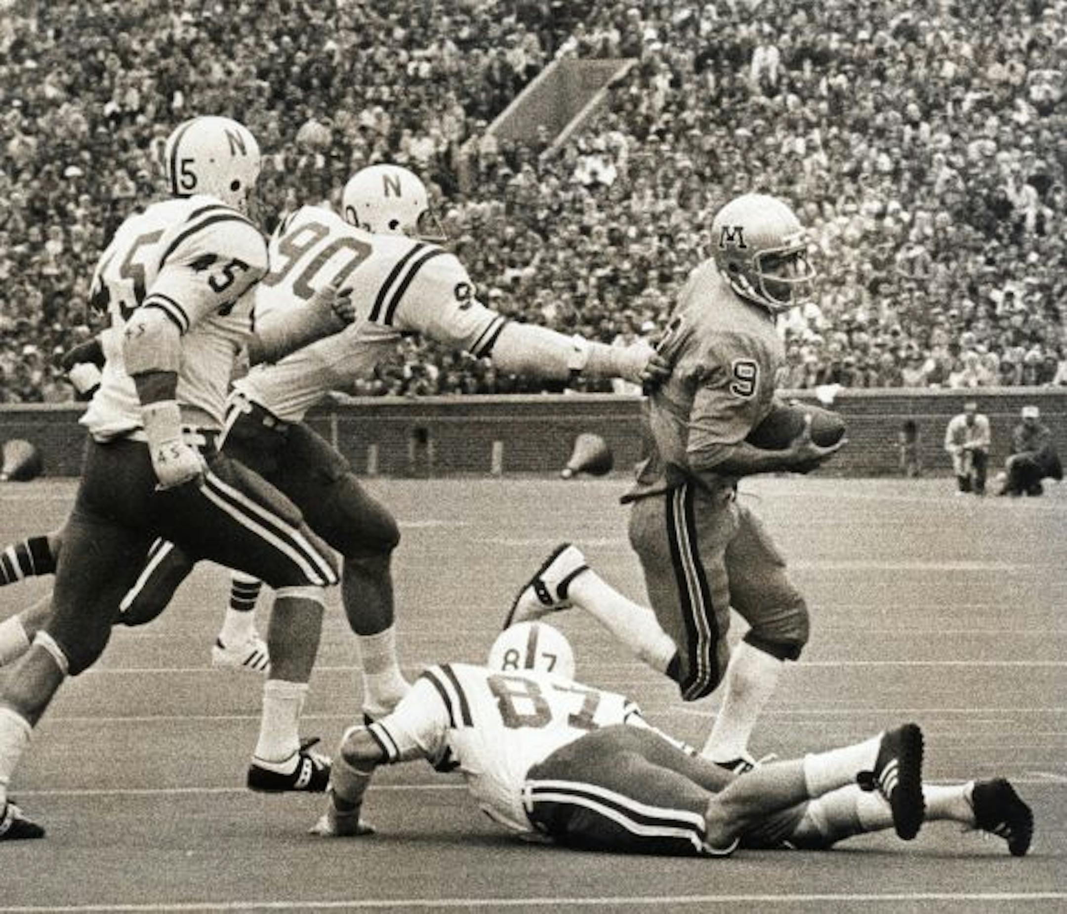 Tony Dungy, shown here as the Gophers quarterback in the mid-1970s