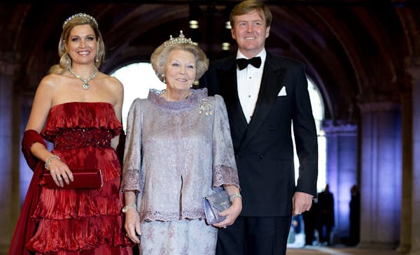 Dutch Queen Beatrix, center, and Dutch Crown Prince Willem-Alexander and his wife Princess Maxima arrive for a banquet hosted by the Dutch Royal famil