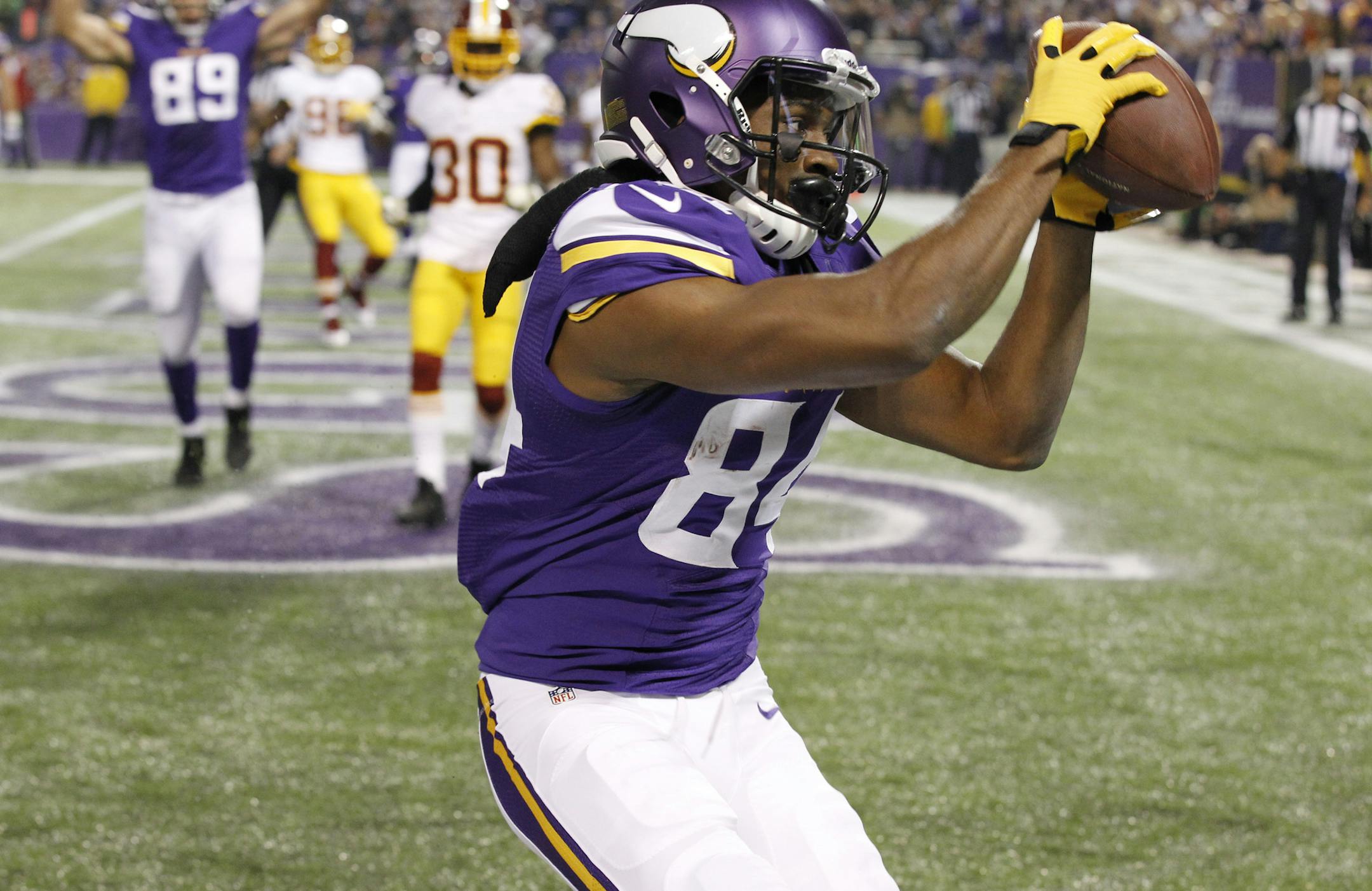 Minnesota Vikings wide receiver Cordarrelle Patterson catches a 2-yard touchdown pass during the first half of an NFL football game against the Washington Redskins, Thursday, Nov. 7, 2013, in Minneapolis. (AP Photo/Ann Heisenfelt)