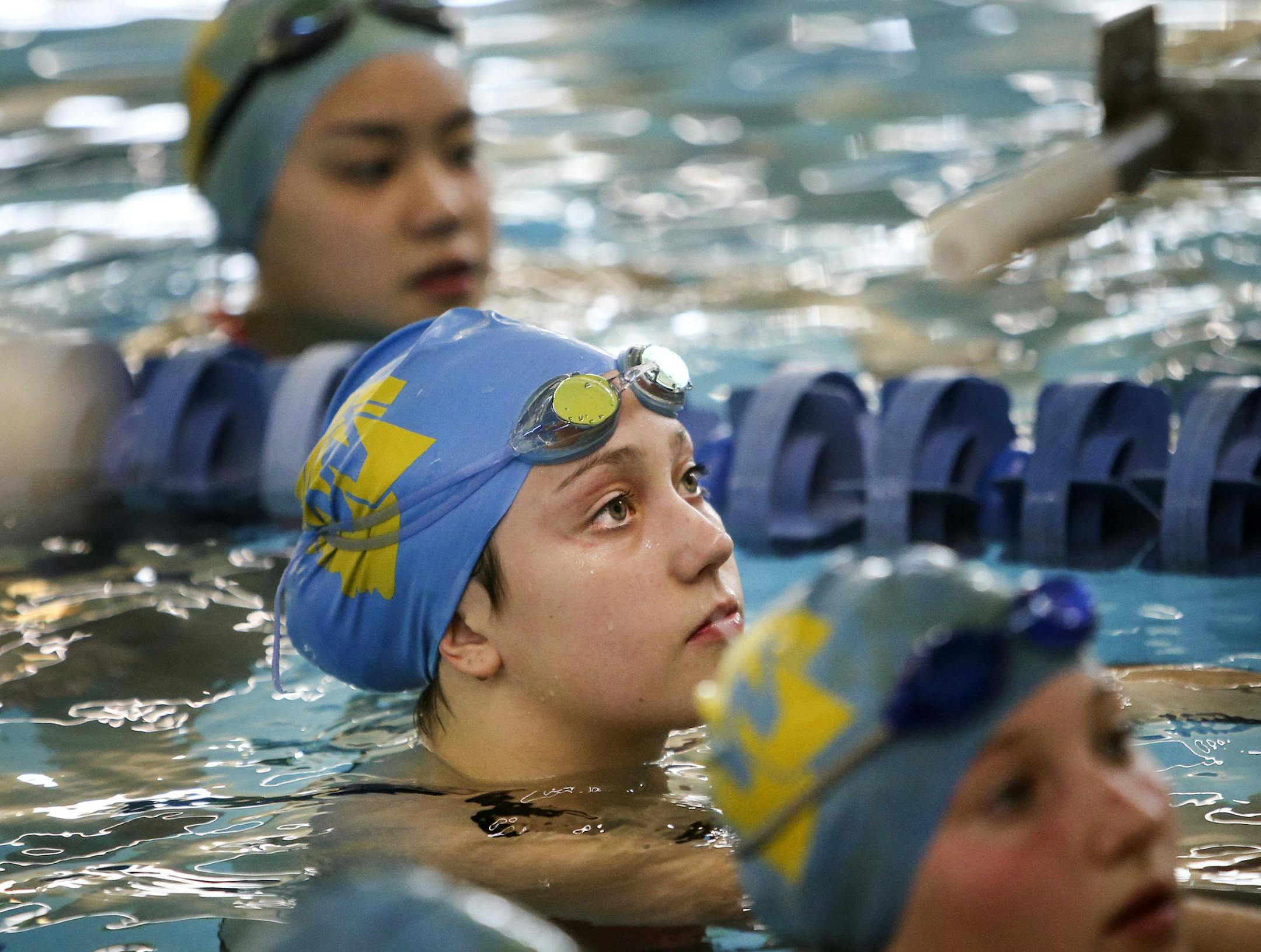 Wayzata High girls' team swimmer Madison Preiss listens to her coach during practice Saturday, Sept. 27, 2014, at Lifetime Fitness in Plymouth, MN.](DAVID JOLES/STARTRIBUNE)djoles@startribune.com Feature on Wayzata High School girls swimming and diving team.**Madison Preiss,cq