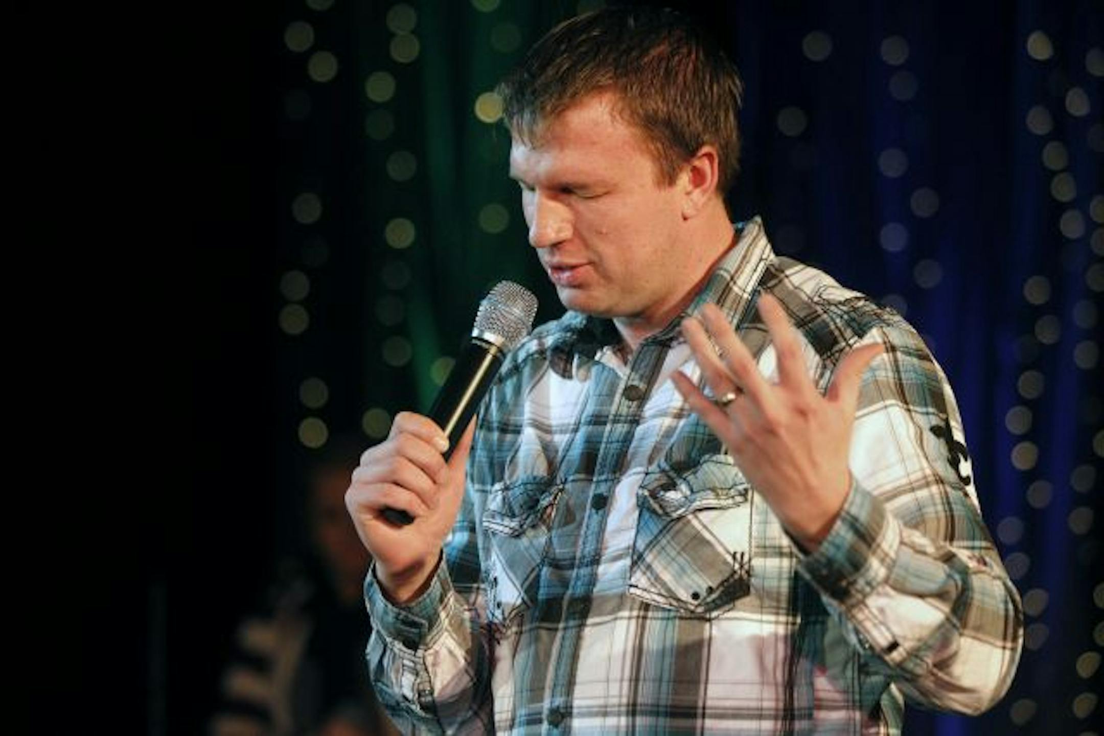 At the Valley Creek Church service held at Oak Land Jr. H.S., head pastor Trent Redmann heads a church that must be assembled and packed into 24 cases that fit into two 24-foot trailers almost every weekend.