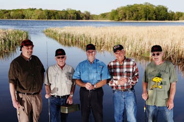 From left to right, Terry "Bo" Beaudry, John "Z" Zollars, Bill "Vodi" Voedisch, Herb "Calf Man" Polzin and Dean "Scrawn" Sweeney have been fishing tog