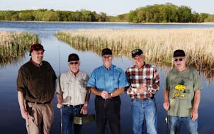 From left to right, Terry "Bo" Beaudry, John "Z" Zollars, Bill "Vodi" Voedisch, Herb "Calf Man" Polzin and Dean "Scrawn" Sweeney have been fishing tog
