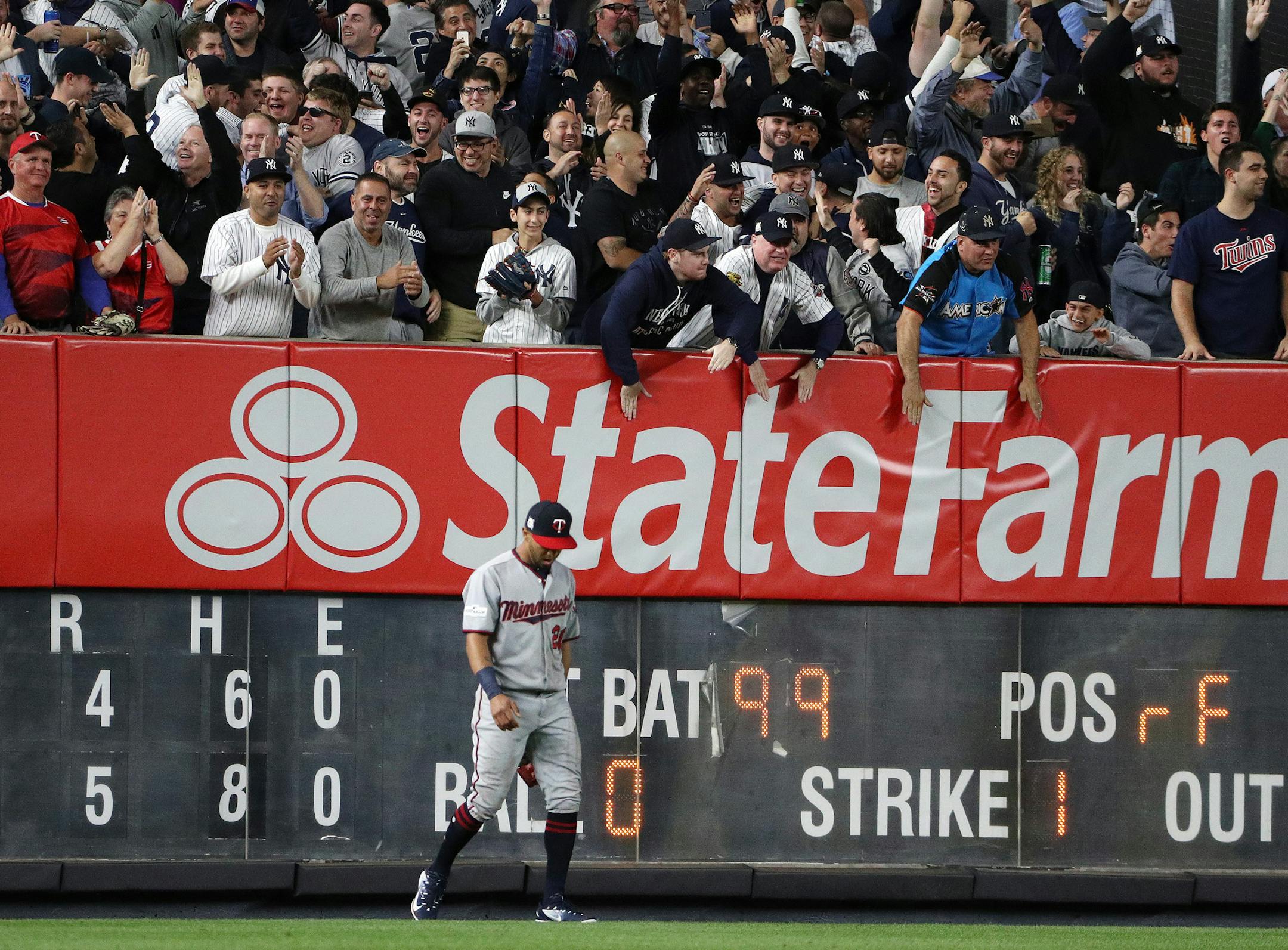 Minnesota Twins left fielder Eddie Rosario (20) hung his head after he was unable to grab a two-run home run hit by New York Yankees right fielder Aaron Judge (99) in the fourth inning. ] ANTHONY SOUFFLE &#xef; anthony.souffle@startribune.com Game action from an American League Wild Card playoff game between the Minnesota Twins and the New York Yankees Tuesday, Oct. 3, 2017 at Yankee Stadium in New York.