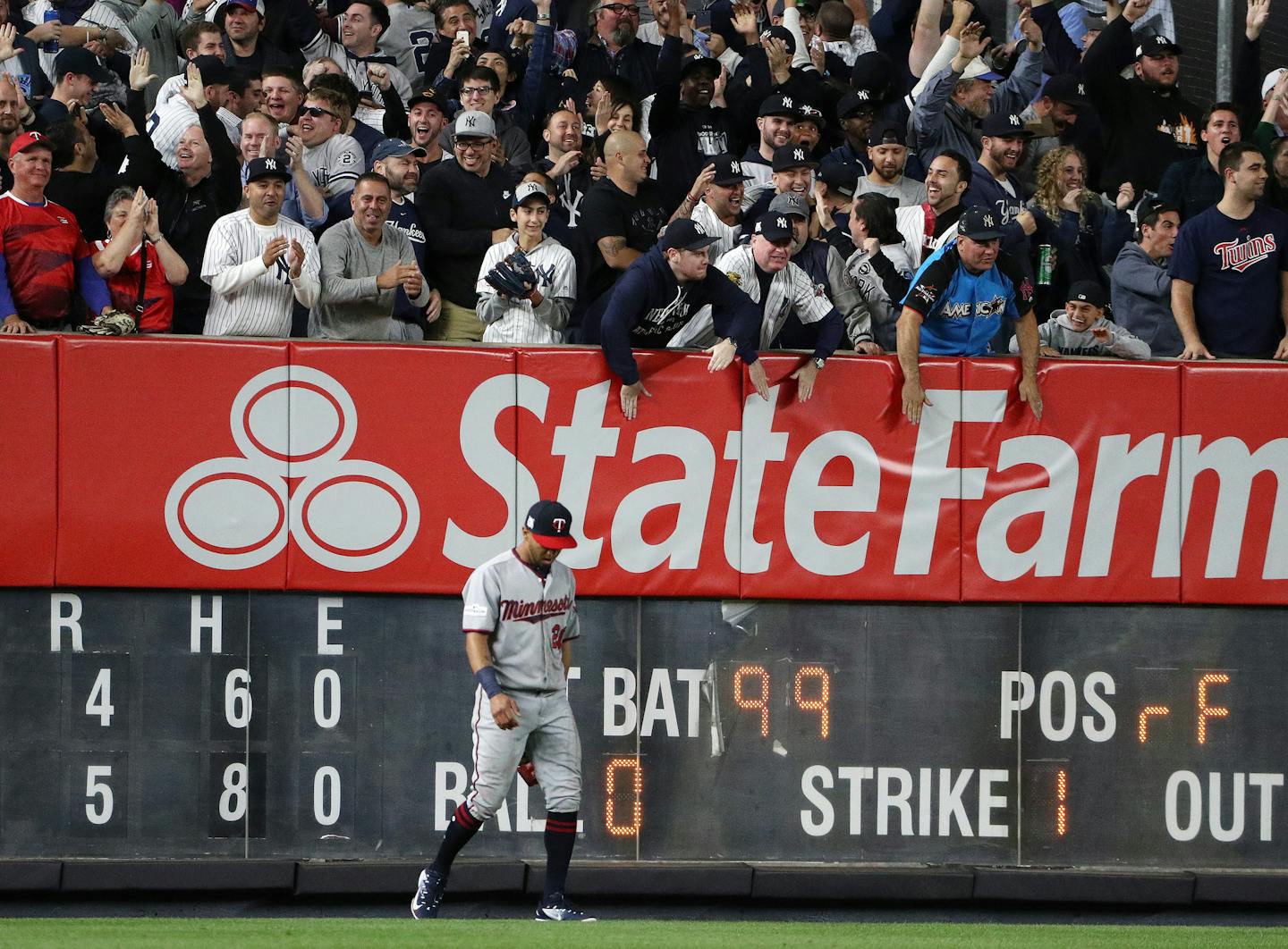 Minnesota Twins left fielder Eddie Rosario (20) hung his head after he was unable to grab a two-run home run hit by New York Yankees right fielder Aaron Judge (99) in the fourth inning. ] ANTHONY SOUFFLE &#xef; anthony.souffle@startribune.com Game action from an American League Wild Card playoff game between the Minnesota Twins and the New York Yankees Tuesday, Oct. 3, 2017 at Yankee Stadium in New York.