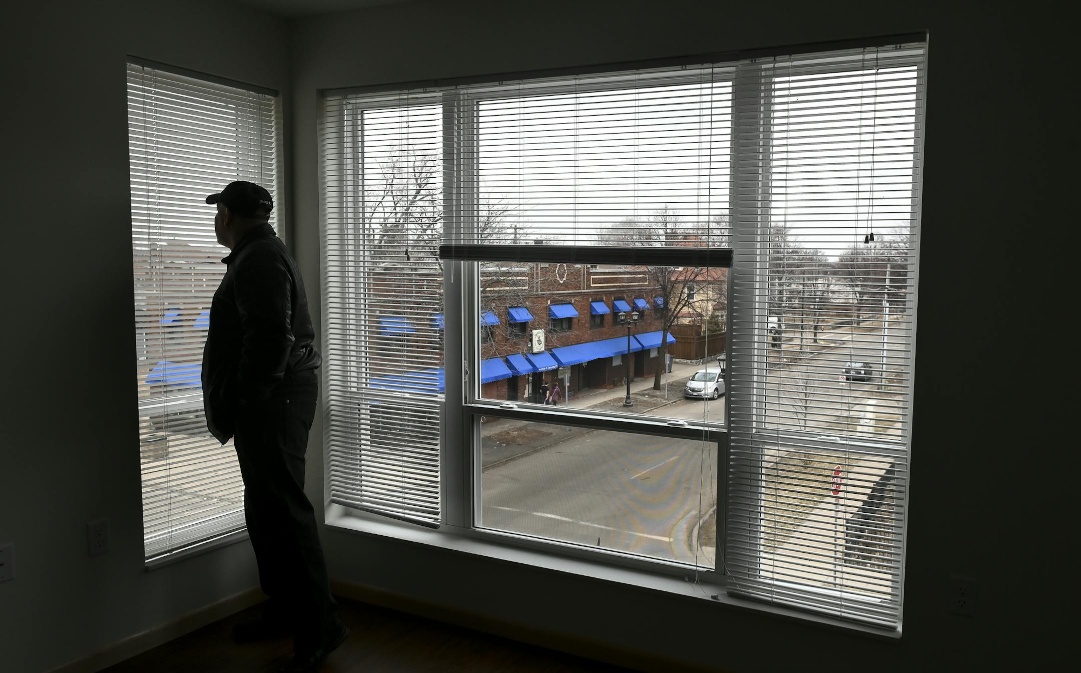 Golden Thyme coffee shop owner Mychael Wright looked out from one of the windows in a new senior housing unit which is part of the Selby Milton Victoria Project at North Victoria Street and Selby Avenue Wednesday. ] Aaron Lavinsky &#xa5; aaron.lavinsky@startribune.com Work is almost complete at the Selby Milton Victoria Project, two newly constructed commercial buildings in the historic Rondo area of St. Paul. Senior housing and an array of black businesses including Selby Avenue staple Golden T