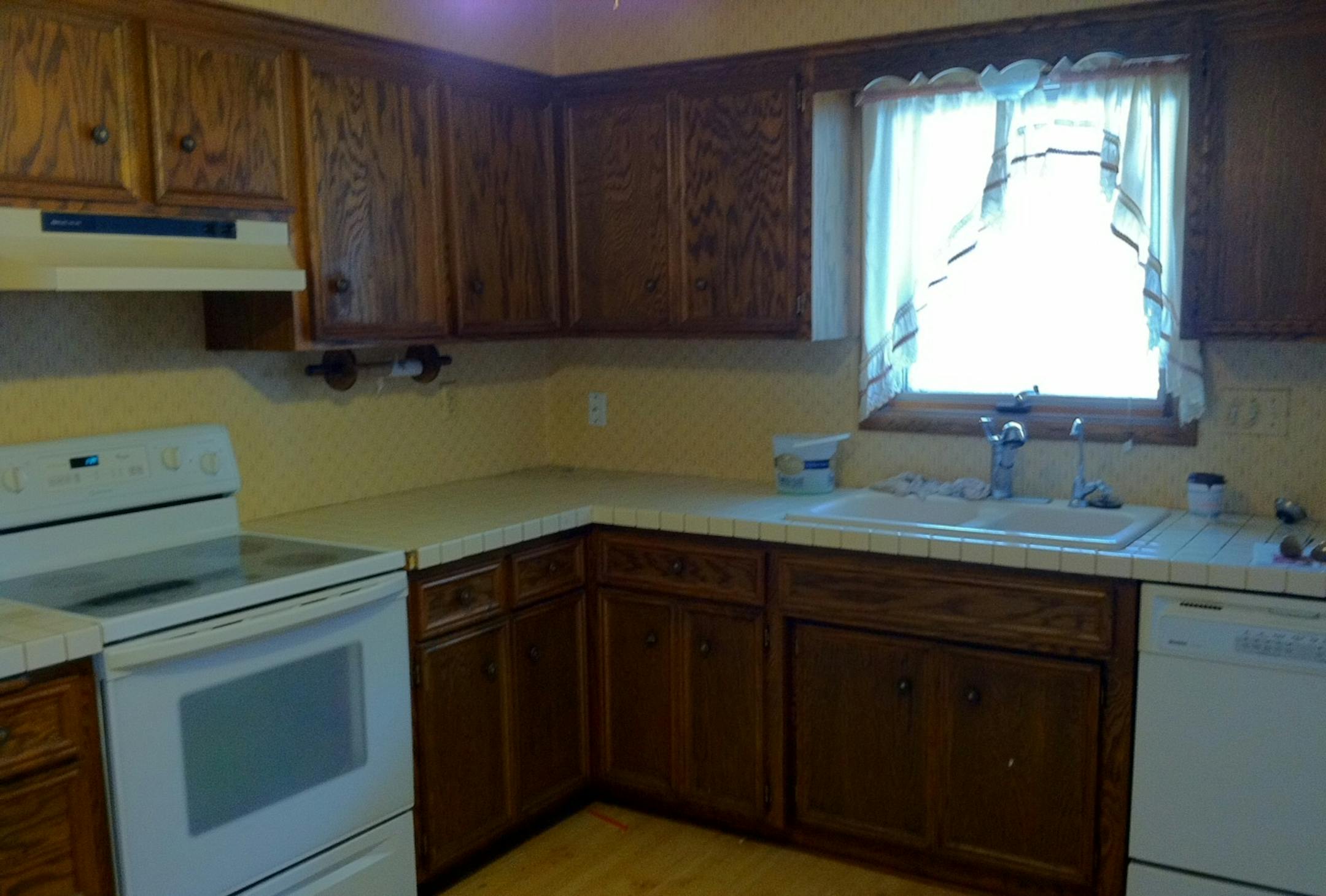 BEFORE kitchen makeover by Traci Dokken Designs.