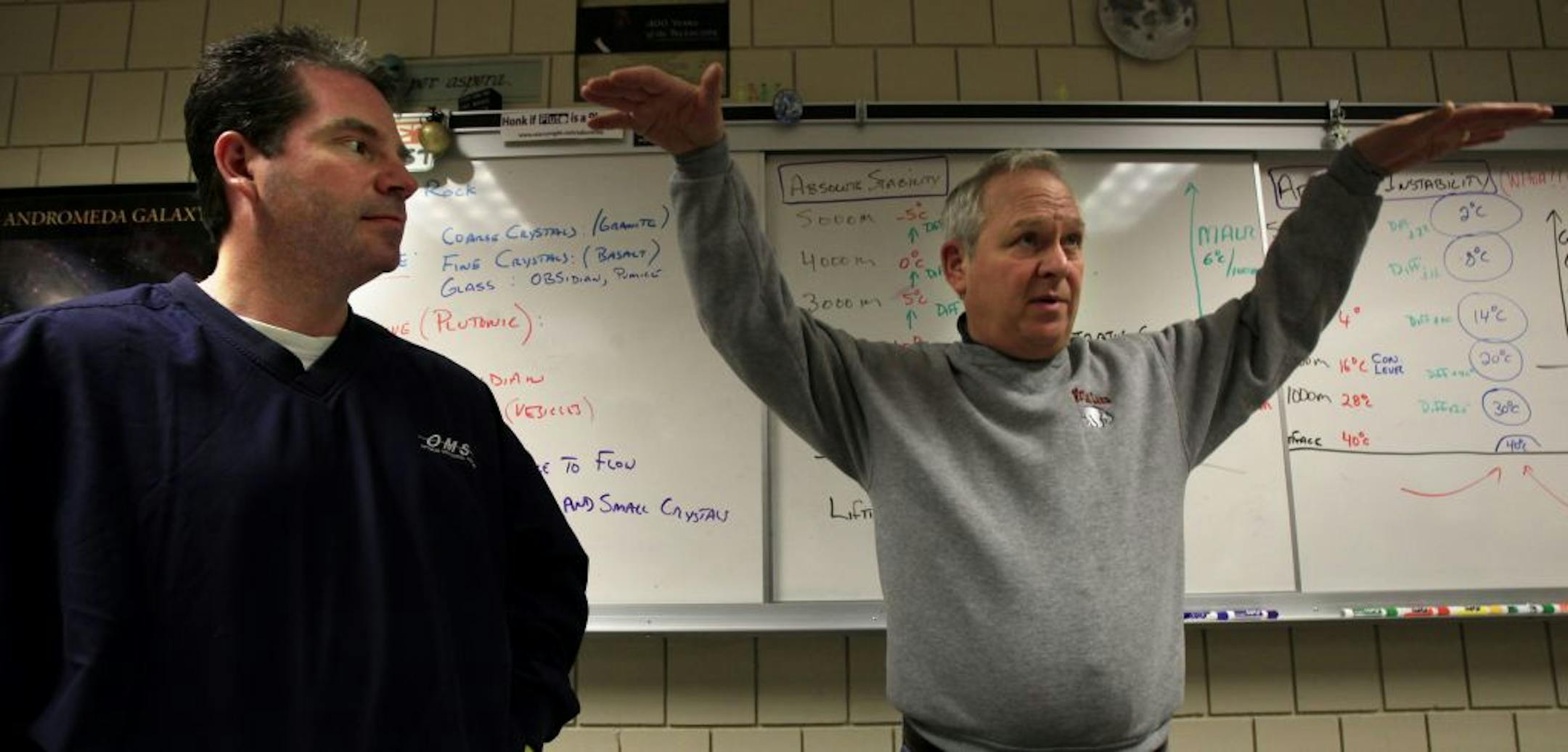 Aviation instructor Peter Pitman (right), and the White Bear Lake High School started an aviation class in memory of the son of John Marzitelli (left), who was killed in an aviation accident a few years ago.