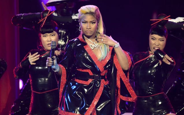 FILE - This June 24, 2018 file photo shows Nicki Minaj performing at the BET Awards in Los Angeles. Minaj is pulling out a concert in Saudi Arabia bec