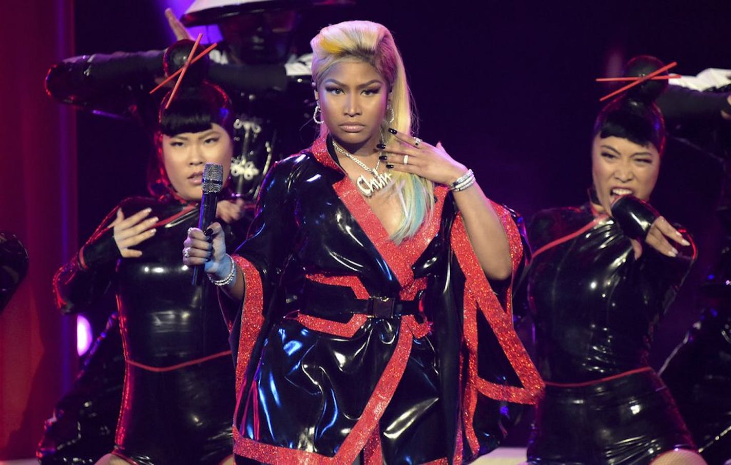 FILE - This June 24, 2018 file photo shows Nicki Minaj performing at the BET Awards in Los Angeles. Minaj is pulling out a concert in Saudi Arabia because she says she wants to show support for women's rights, gay rights and freedom of expression. She was originally scheduled to headline the concert on July 18, 2019. The Human Rights Foundation issued a statement last week, calling for Minaj and other performers to pull out of the show.