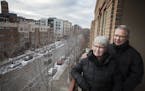 Jan and Art Larson on the balcony of their downtown Minneapolis condo.