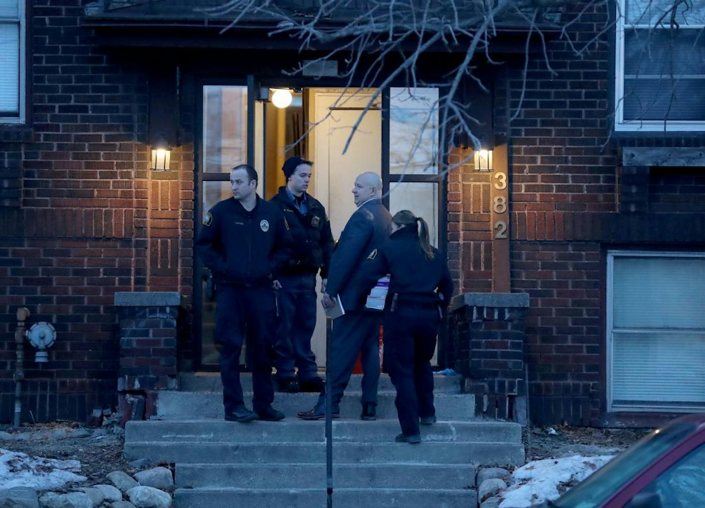 Police were called to a scene in St. Paul during the early morning hours where a woman was found unresponsive and later died. Here, police investigators enter the apartment building Wednesday, Feb. 26, 2020, in St. Paul, MN.