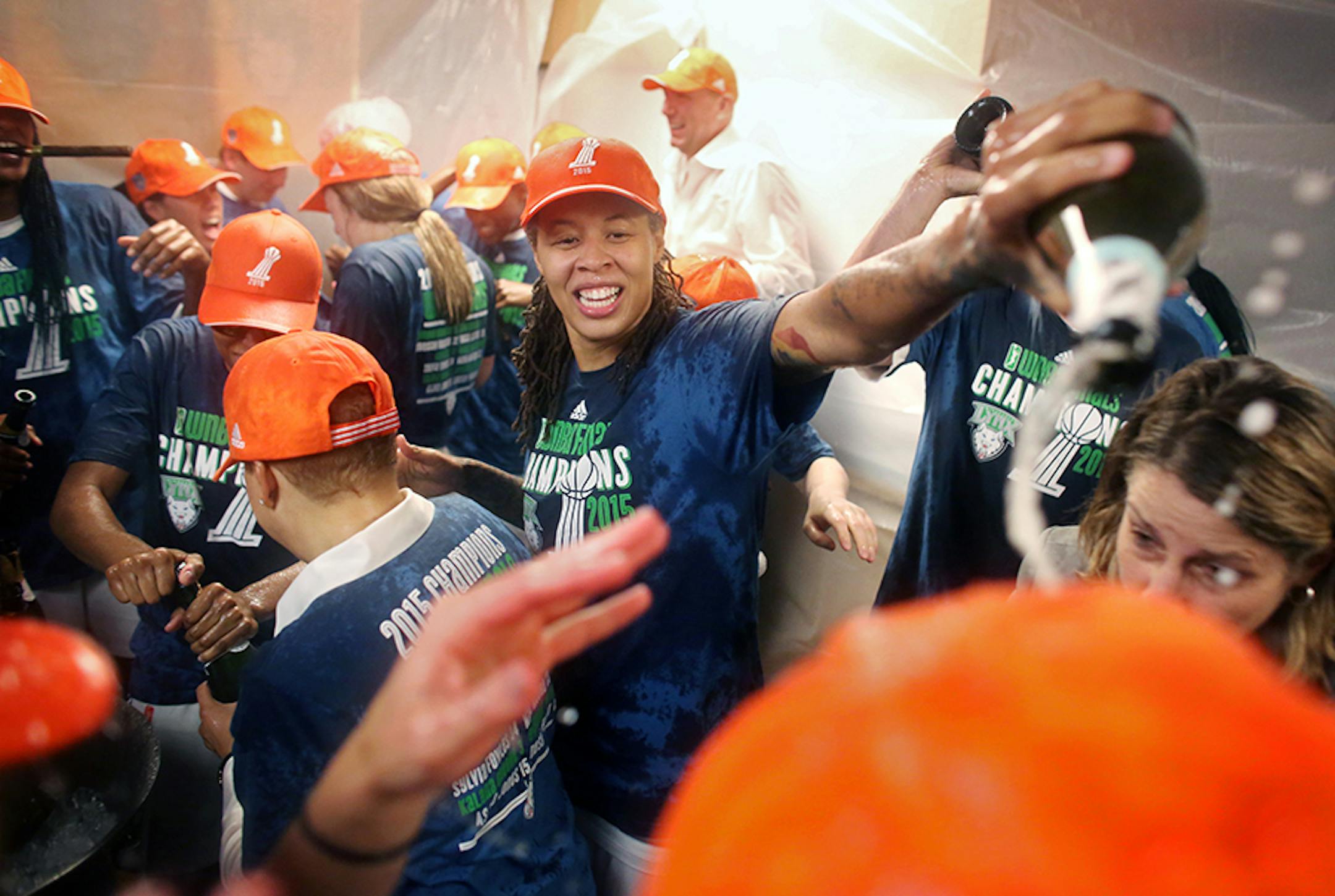 The Minnesota Lynx celebrate winning the WNBA title.
